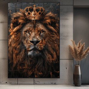 May include: A close-up of a lion's face with a gold crown on its head. The lion's fur is brown and the background is a dark gray with a cracked texture.