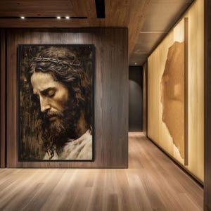 May include: A framed painting of a man with a crown of thorns and a beard, with a dark wood background.