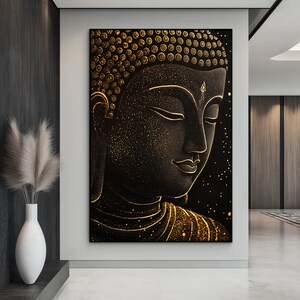 May include: A large, framed canvas print featuring a detailed, golden-hued Buddha head against a black background. The artwork has a textured appearance with intricate details and a serene expression. The Buddha's face is illuminated with golden accents.