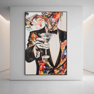 May include: A colorful abstract painting of a person in a tuxedo holding a martini glass. The person's face is obscured by colorful abstract shapes and lines.