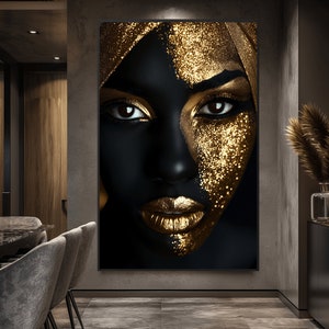 May include: A close-up of a woman's face with black skin and gold glitter makeup. The woman is wearing a gold headscarf. The background is black.