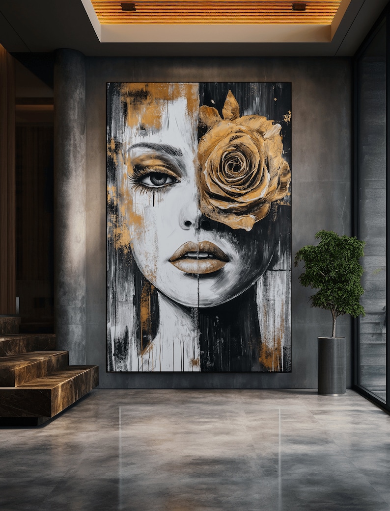 May include: Abstract painting of a woman's face with a large golden rose covering one eye. The painting is done in black, white, and gold paint.
