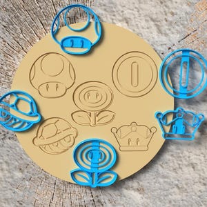 Foremki do ciastek Mario: grzyb, ognisty kwiat, moneta, muszla, korona, żółw