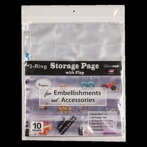 May include: A clear plastic 3-ring storage page with a flap for embellishments and accessories. The page has 10 pockets, each measuring 2 inches by 2 inches. The page is designed to hold small items like buttons, beads, and charms. The page is archival safe and acid-free, and it has UV protection.