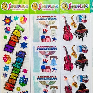 Adesivos vintage Sandylion Prismatic Happy Hanukkah, orquestra de instrumentos musicais, estátua da liberdade da América, portas de Natal, pacote selado