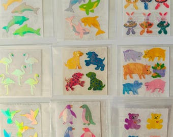 ビンテージのレアなサンディリオン ステッカー パックとマキシ