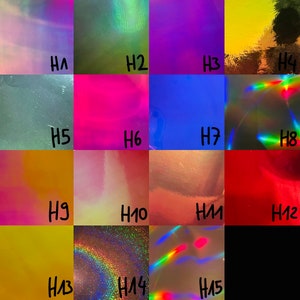 Peut inclure: Une grille de 15 feuilles de vinyle holographique iris&eacute; de diff&eacute;rentes couleurs, notamment bleu, vert, violet, rose, rouge et or. Chaque feuille est &eacute;tiquet&eacute;e d'un num&eacute;ro de H1 &agrave; H15.