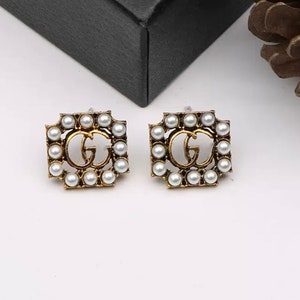 gold pearl chanel earrings vintage