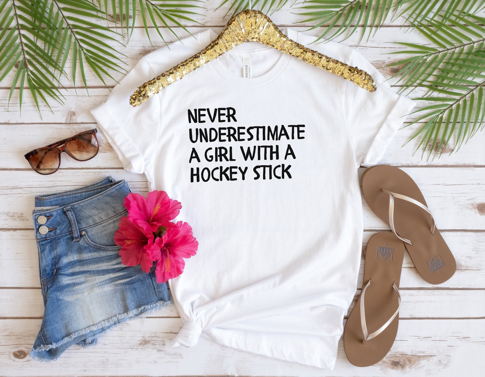 TeeGames Never Underestimate A Girl with A Hockey Stick Shirt, Hockey Life Tee, Hockey Player Gift, Hockey Shirt, Hockey Lover Shirt, AY231