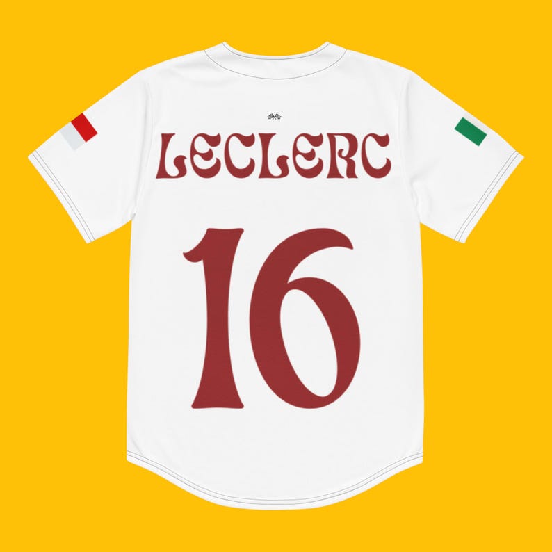 May include: White jersey with red and green accents. The back of the jersey has the name "Leclerc" and the number "16" in a retro font.