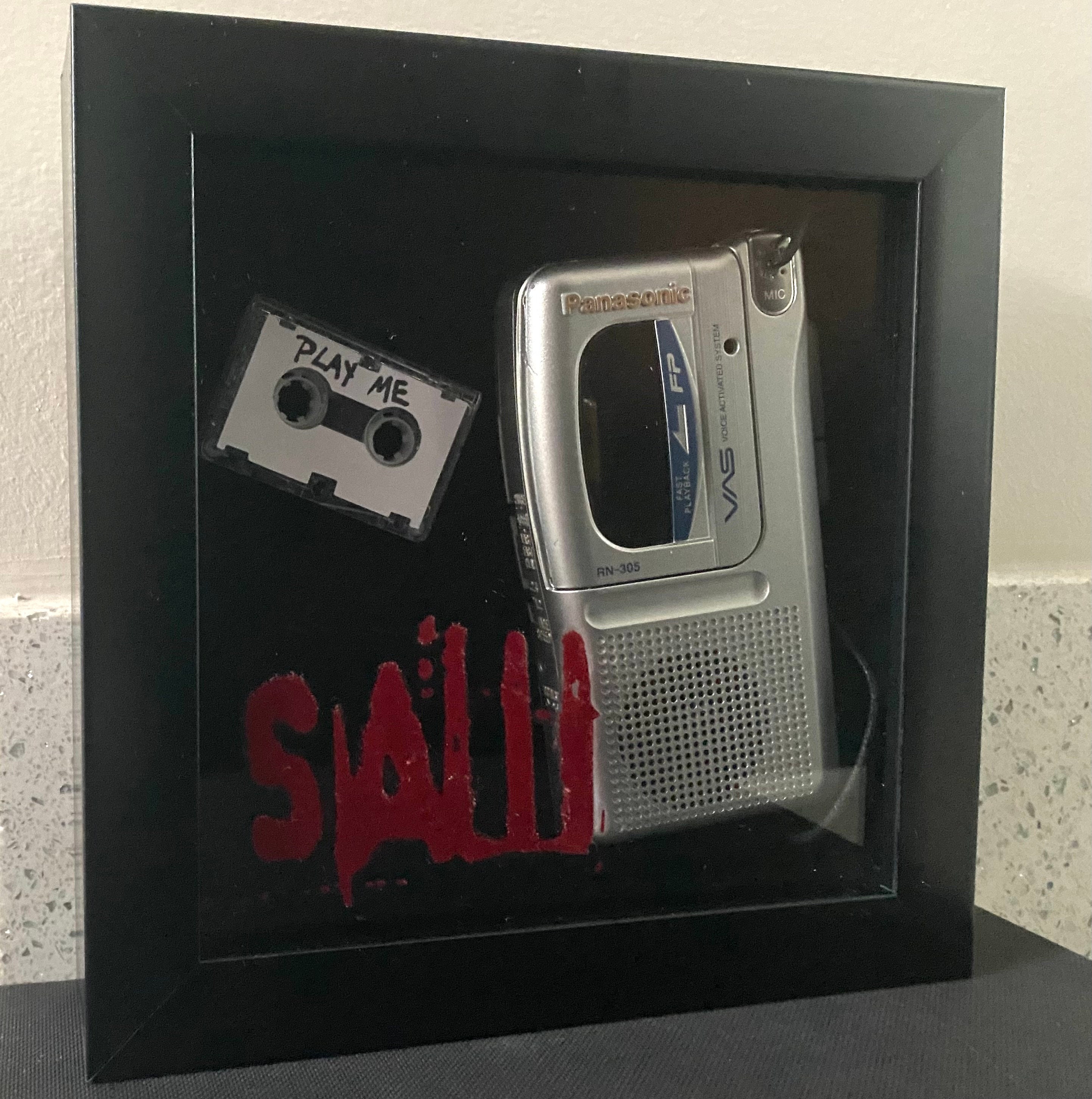 Saw I Microcassette Display Box With Microcassette and Tape (not