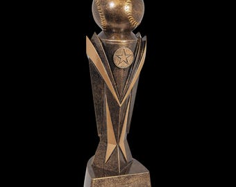 May include: A bronze baseball trophy with a baseball on top. The trophy has a star emblem and gold accents. The base is square and the background is black.
