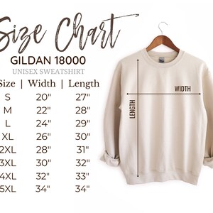 May include: Size chart for a Gildan 18000 unisex sweatshirt. The chart shows the width and length in inches for sizes S through 5XL.