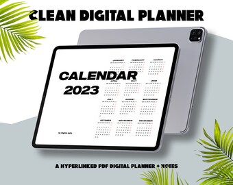May include: A digital planner on a tablet displays a 2023 calendar. The text "CLEAN DIGITAL PLANNER" and "CALENDAR 2023" are at the top. The bottom text reads "A HYPERLINKED PDF DIGITAL PLANNER + NOTES". The tablet is silver.