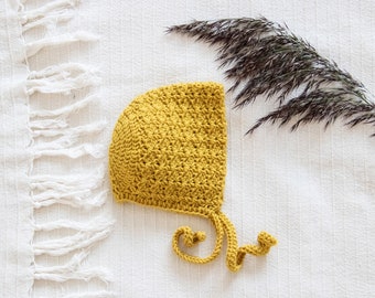 Crochet baby bonnet mustard