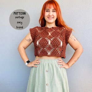 May include: A brown crochet top with a lacy pattern. The top is cropped and has short sleeves. The text "PATTERN vintage easy trend" is visible in the image.