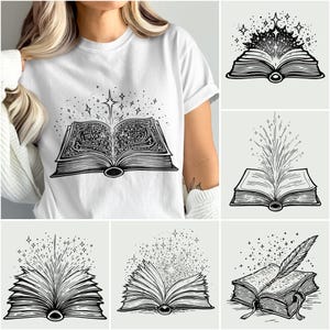 May include: White t-shirt featuring a black and white illustration of an open book with radiating stars and text. The design is centered on the shirt, with the book's pages open and emitting a burst of light and stars.
