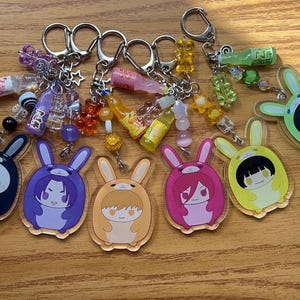 Anime blue lock keychain, anime inspired, manga style accessory, beaded friendship keychain