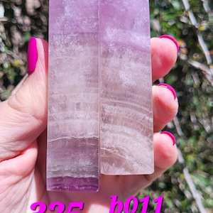 Pink fluorite towers. Nice pink banded fluorite tower. Pink crystal flourite towers.