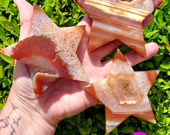 Carnelian banded quartz star crystal carvings. Gorgous druzy and banding!  3.5 to 4"