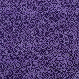 May include: Purple fabric with a repeating pattern of dark purple circles and rings.