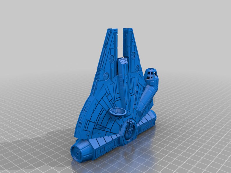 May include: A blue 3D printed model of a spaceship with a detailed design. The spaceship has a long, narrow body with two large wings and a small cockpit.