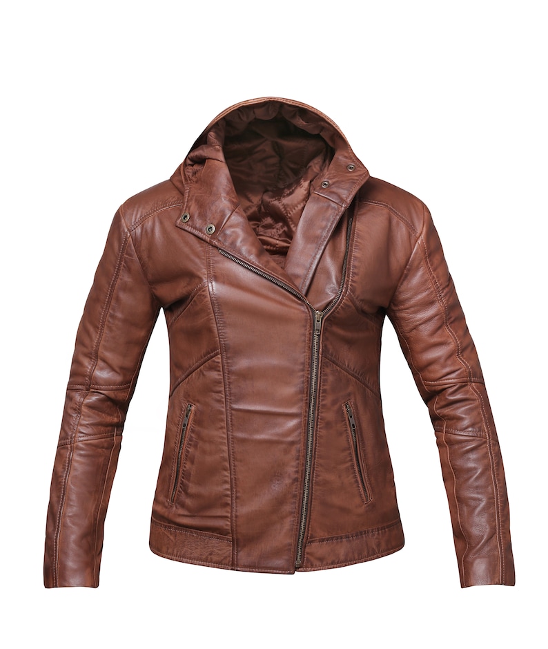 May include: A brown leather jacket with a zipper closure and a hood. The jacket has two pockets on the front and two pockets on the inside.