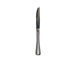 May include: A single, stainless steel butter knife with a curved blade and a decorative handle. The handle has a flared shape with a rounded end and a series of ridges near the blade. The knife is set against a white background.