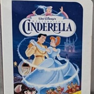 Sealed NRFB 1995 Walt Disney Masterpiece Collection Happy Meal Toy - Cinderella Figurine in Toy Sized VHS Cassette Tape Box