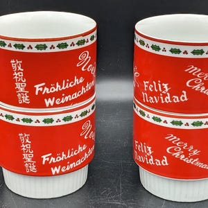 Stapelbara muggar med vintagemotiv, jul, världen runt, set om 4 - Festlig flerspråkig glädje