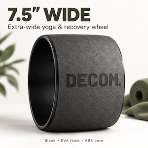 May include: A black yoga and recovery wheel featuring a textured EVA foam exterior and an ABS core. The wheel is 7.5 inches wide and displays the text DECOM. embossed on the surface. The design includes a smooth black interior rim.