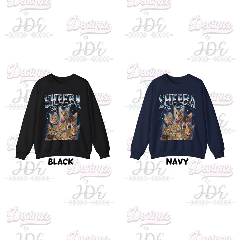 May include: Two sweatshirts with a graphic print of a group of cats with the text "SHEEBA The Bengal" in a blue and white font. The sweatshirt on the left is black and the sweatshirt on the right is navy blue.