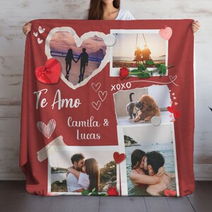 May include: A red fleece blanket with a collage of photos and hearts. The photos show a couple on a beach, a couple kissing, and a dog and cat. The text "Te Amo Camila & Lucas" is written on the blanket.