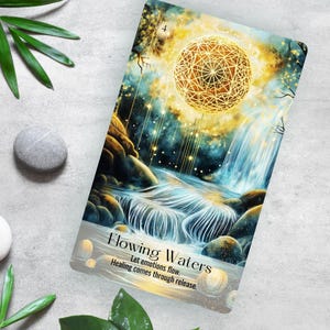 Flowing Waters oracle card with gold star of life art on river and waterfall background