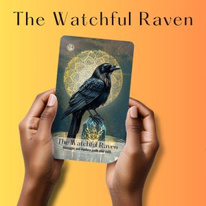 Watchful Raven oracle card held against bold orange background from Nature & Intuition Oracle Deck