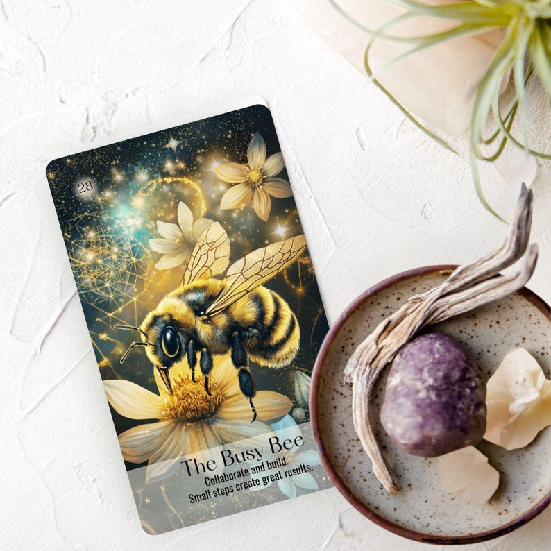 The Busy Bee Oracle card with gold light and florals from Nature & Intuition nature-based deck