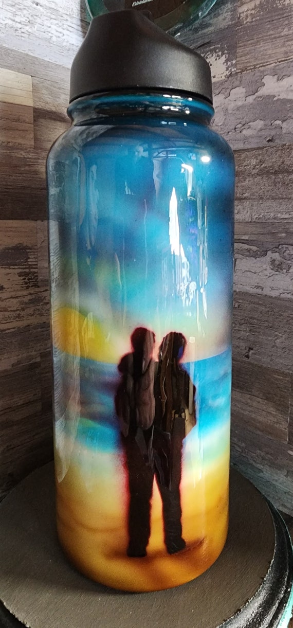 Airbrushed sunset with a father and child