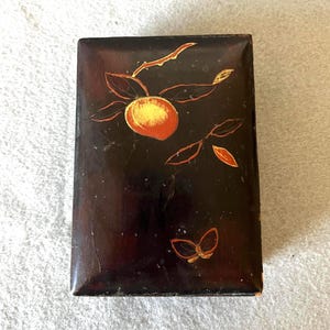 Vintage small Asian or Japanese style persimmon black lacquerware box