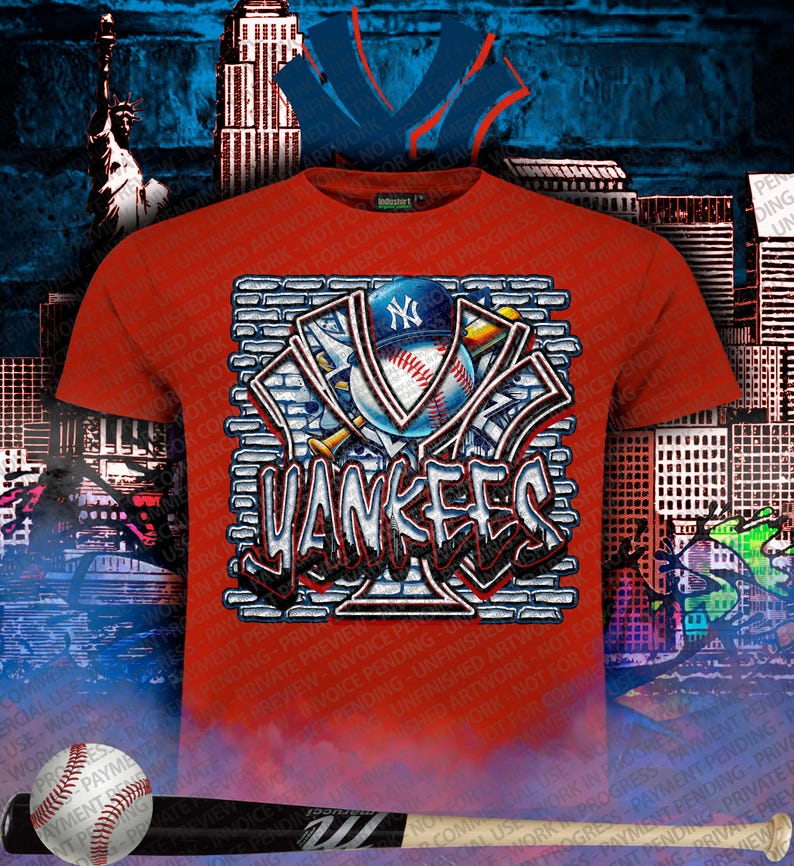 May include: Red t-shirt featuring a graphic design of the New York Yankees logo, baseball, and a baseball bat. The design incorporates brick-like elements and graffiti-style lettering. The background includes cityscapes and the Statue of Liberty.
