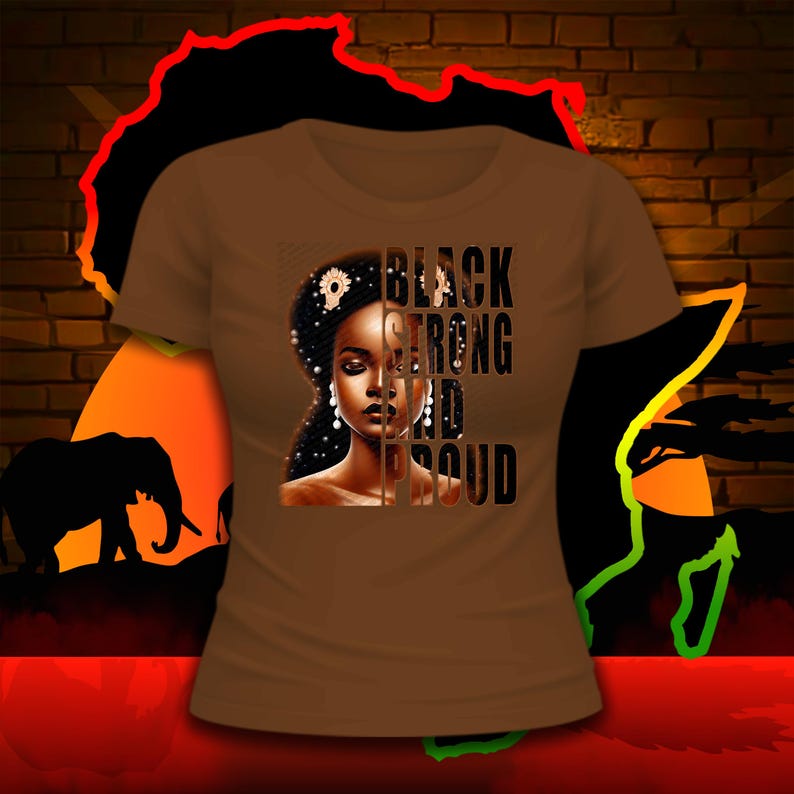 Puede incluir: Camiseta marr&oacute;n con un gr&aacute;fico de una mujer negra con el texto "BLACK STRONG AND PROUD" impreso verticalmente.
