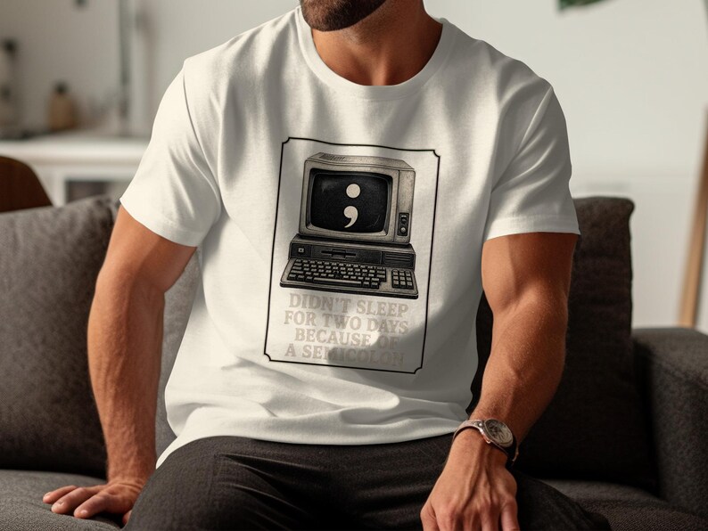 T-shirt with vintage computer graphic and text: "Didn't sleep for two days because of a semicolon."