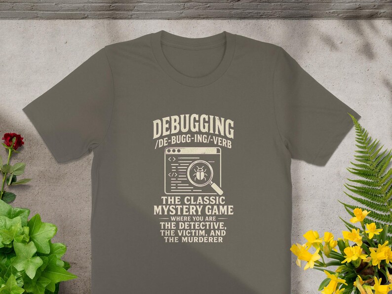 Shirt with text "Debugging: The Classic Mystery Game" and a magnifying glass over a bug.