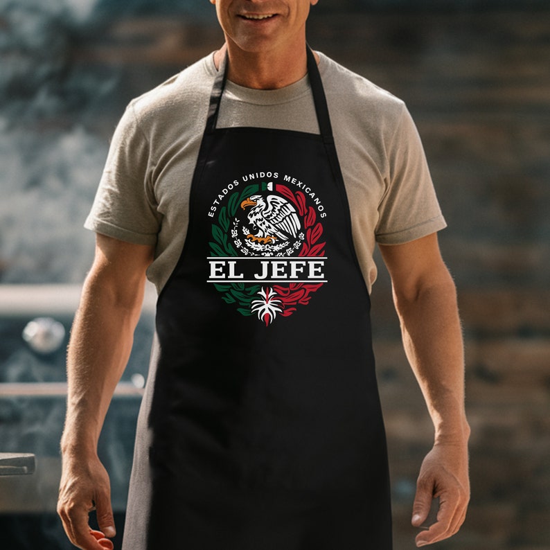May include: Black apron with a white graphic of the Mexican coat of arms with the text "Estados Unidos Mexicanos" and "El Jefe" below.