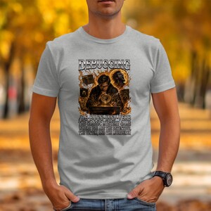 Grey t-shirt with "DEBUGGING" and text about a classic mystery game.