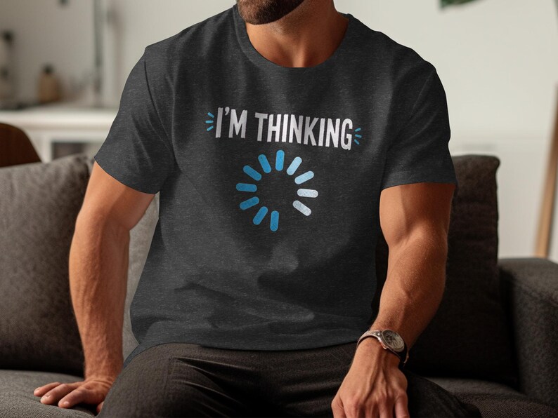 Dark grey t-shirt with "I'M THINKING" and a blue loading circle design.