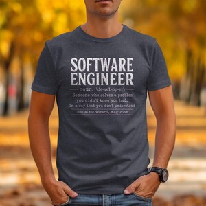 Dark gray t-shirt with "Software Engineer" definition and witty description.