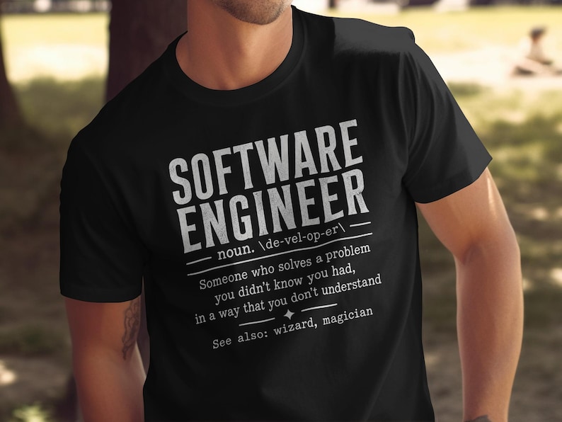 Black t-shirt with white text: "Software Engineer" definition.