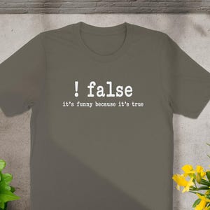T-shirt with text "! false it's funny because it's true"