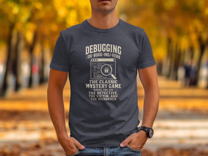 Men's dark t-shirt with "Debugging The Classic Mystery Game" text and bug graphic.