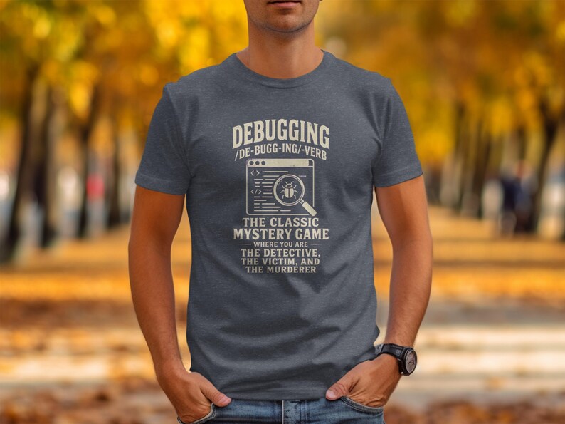 Dark grey t-shirt with text "Debugging: The Classic Mystery Game".